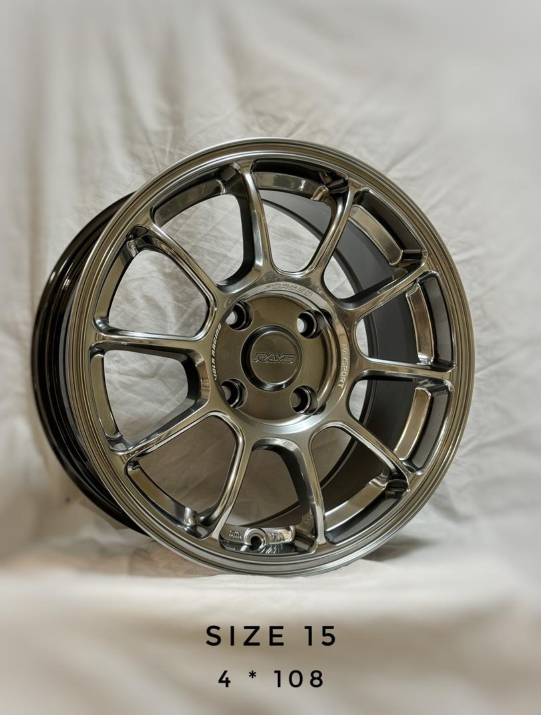 ربنگ اسپرت سایز ۱۵ (۴×۱۰۸) دودی RAYS (پژو،سمند،دنا)